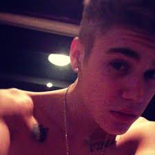 Check spelling or type a new query. Shirtless Justin Bieber Tries To Upstage Grammys Takes Down Ustream Instead The Verge