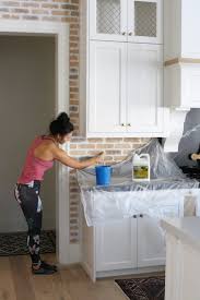 It's durable and easy to clean from anything, and industrial touches like brick or pipes are very hot and trendy right now. Diy Brick Backsplash With German Schmear Lushes Curtains Blog