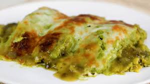 Heat 1 tablespoon oil in a pan over medium heat and cook the onions for about 1 minute. Creamy Chicken Enchiladas Suiza Video Kevin Is Cooking