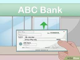 How to transfer money from one bank to another. 3 Ways To Cash A Cheque Wikihow