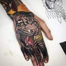 Clouded leopard hand tattoo | Best tattoo designs, Tattoo designs men, Cool  tattoos