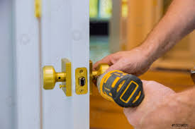 Closeup Of A Professional Locksmith Installing Or New Lock On, Stock Photo  | Crushpixel