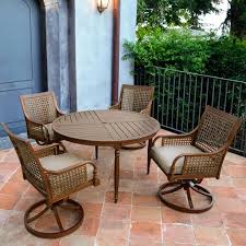 This allows enough space to pull out chairs, but not much walk around space. Arabella 5 Piece Aluminum Patio Dining Set W 48 Inch Round Table Swivel Rocker Dining Chairs Sunbrella Cast Ash Cushions By Lakeview Outdoor Designs Walmart Com Walmart Com