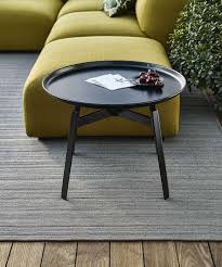 A clear glass top with no dots created a light and elegant look. Small Table Husk Outdoor B B Italia Outdoor Design By Patricia Urquiola