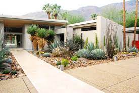 There is a great water view from the small front yard, but it overlooks the driveway. Required Reading The Mid Century Modern Garden By Ethne Clarke Gardenista Modern Landscape Design Modern Garden Modern Landscaping