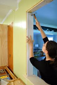How To Trim Out A Cased Opening And A Half Wall Young House Love Half Walls Half Wall Kitchen Wall Trim