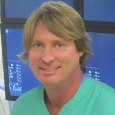 James Milburn MD, FACR, FSNIS, MMM