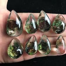 Tourmalated quartz is a crystal quartz that has formed together with black tourmaline, with the tourmaline penetrating the quartz and creating the description 'tourmalated'. 25 Garden Quartz Ideas Quartz Garden Phantom Quartz