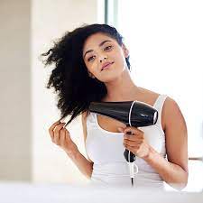 Set the dryer on a low or medium heat setting. If You Must Use A Dryer Here S How To Protect Your Natural Hair Naturallycurly Com