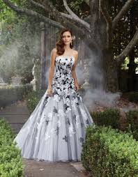 A white dress with black lace, fabric flowers or patterns is a cool idea, it looks very feminine, and many designers created wonderful gowns like that. 30 Ideas Of Beautiful Black And White Wedding Dresses The Best Wedding Dresses