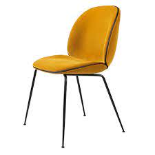 Tapered legs, black wood, and pewter leatherette upholstery combine to create a bold and modern look. Beetle Fully Upholstered Dining Chair Yellow Velvet Black Leather Piping Black Conic Base Rouse Home