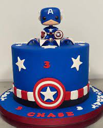 This incredibly fun, super decadent, captain america themed m&m®'s chocolate chip cookie cake will have all the superhero loving members of your family smiling and going back for bite after bite of. Captain America Cake Design Images Captain America Birthday Cake Ideas