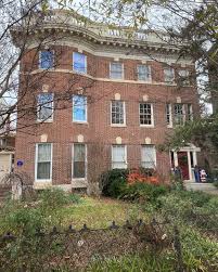 I photographed this beautiful Bolton Hill home last year, and it's stuck  with me since then! The striking facade conceals the fact that this is  actually two homes (the entrance for the