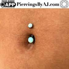 Piercings By Aj Fully Healed Navel Piercing With A White Opal Navel Piercing Anatometal Hip Piercings