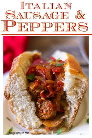 Italian Sausage And Peppers In A Large Piece Of Italian Bread With Sauteed Diced Tomatoes In 2020 Sausage And Peppers Italian Sausage Stuffed Peppers