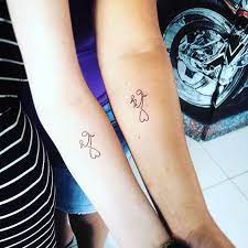 This tattoo is cute and represents a mom's love and care for the son. Mother And Son Matching Tattoos Mother Son Tattoos Mother Tattoos Momcanvas