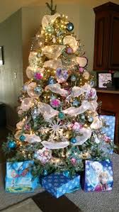 By kelby vera and rianne addo for mailonline. Frozen Themed Christmas Tree Christmas Decorations Disney Christmas Dec Christmas Tree Themes Christmas Tree Themes Unique Christmas Tree Decorating Themes