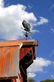 The answers may surprise you! Weather Vane On Top Of Red Barn Is A Metal Rooster Sitting On Stock Photo Picture And Royalty Free Image Image 102868255
