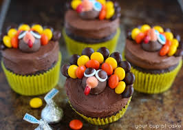 Little ones will love decorating (and devouring!) these cute thanksgiving cupcakes adorned with nutter butter cookies and candy corn. Turkey Cupcakes Thanksgiving Cupcake Decorating Your Cup Of Cake