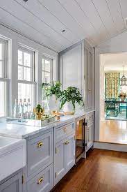 We did not find results for: Gray Shaker Drawers With Polished Brass Cup Pulls Transitional Kitchen