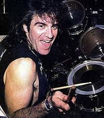 I'd like to wish our drummer David Magnelli a very happy Drummers Day.  Still kickin' ass after all these years. You have been my brother since the  day we met and will