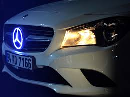 The accessory is priced at $480 uninstalled with dealer installation costs separate. Mercedes Benz Light Up Logos