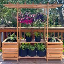 Be assured that we're going to go over a multitude of plant stands here today, brining in corner plant shelves, window plant stands, outdoor plant shelves, and so on. Diy Outdoor Plant Stand With Arbor The Handyman S Daughter
