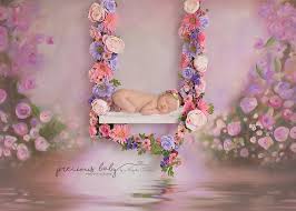 The cheapest flight price from new haven to indiana is $139. Gorgeous Photo Of Newborn Baby Girl Sleeping On Swing Decorated By Flowers Swing Is Over Water La Baby Photography Photographing Babies Baby Girl Photography