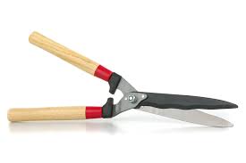 You basically hold the shears like this and with one action, down two or three times down each blade. 7 Common Garden Tools How To Sharpen Them