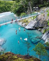 new zealand on instagram who would you jump with stunning capture of the blue pools near lake wanaka by agphotofr lake wanaka nz travel new zealand