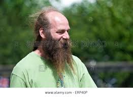 Stock Photo A Man With A Bald Head But A Very Long Beard And A Pony Tail Looks Very Content In The English Countryside Long Beards Bald Heads Balding