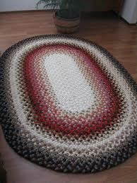 This Gorgeous 100 Wool Handmade Ovalshaped Braided Rug By Trizzygs 400 00 Braided Rug Diy Braided Rag Rugs Diy Rug
