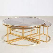 Tiered brass and glass give this coffee table a hint of glamour. Golden Framed Round Glass Coffee Table And Nesting Tables Set 1960s Set Of 5 For Sale At Pamono