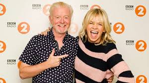 Zoë louise ball (born 23 november 1970 in blackpool, lancashire) is an english television and radio personality, most famous for becoming the first female host of the bbc radio 1 breakfast show and less recently for her presenting of 90s kids show live & kicking. Bbc Zoe Ball To Host The Radio 2 Breakfast Show From 2019