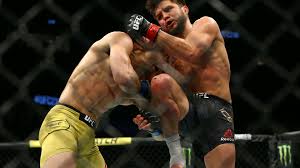 Cejudo now is the fourth fighter in ufc history to hold two titles at the same time, joining conor mcgregor, daniel cormier and amanda nunes. Ufc 238 Results Cejudo Stops Moraes For 2nd Title Shevchenko Retains With Ko Of The Year Head Kick Sporting News