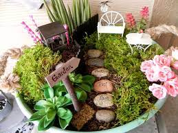 Most garden centers now have areas entirely devoted to this fairy garden hobby. Life Unexpected No Maintenance Fairy Garden Fairy Garden Diy Fairy Garden Fairy Garden Decor