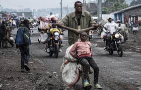 Thousands flee fighting in Congo as rebels claim they've captured the key  city of Goma