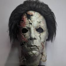 They'll be better compared after the right is finished with paint and hair,  but I wanted a side by side comparison of my 2 RZ Myers masks. Left was  sculpted by Russell