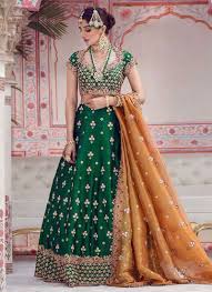 A Heavily Embellished Lehnga Choli In An Especially Weaved Two Tone Raw Silk With Gota Work And French In 2020 Bridal Mehndi Dresses Simple Mehndi Dresses Mehndi Dress
