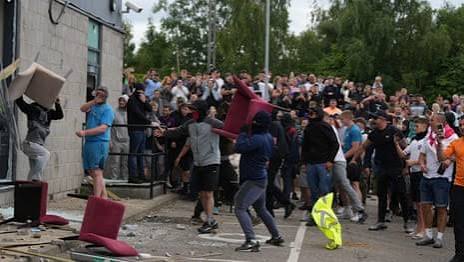 Rioters try to torch Rotherham asylum seeker hotel amid far-right violence | UK news | The Guardian