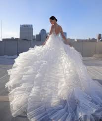 While the national average cost of a wedding dress is $1,631 (including alterations), dress prices are based on various factors and generally range from $500 to $4,000. Elysee By Enzoani Miosa Bride