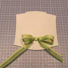 Punch out an ornament shape and stamp a phrase on it. This Bow Will Not Fall Off Your Project Tutorial Card Embellishments Bows Card Making Techniques