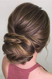 Elegant Low Bun Hairstyle With Blonde Highlights Prom Hairstyle Promhair Hair Styles Cool Hairstyles Bridal Hair Inspiration