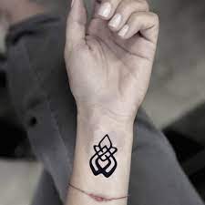 Some of the common symbols used in breast cancer tattoos are: Survivor Symbol Temporary Fake Tattoo Sticker Set Of 2 Amazon De Beauty