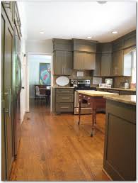 New Cabinet Doors Only Molding Added Above Cabinets To Look Like They Reach The Ceiling Good Idea If Yo Kitchen Soffit Above Kitchen Cabinets Kitchen Remodel
