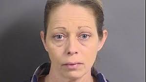 Police: Woman hit man with car because he wouldn't move