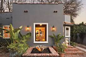 The color orange sky recalls the california poppy and the ochre plaster found on garden walls throughout japan. Charming Spanish Bungalow Converted To Office Exterior Paint Colors For House Exterior House Colors Spanish Style Homes