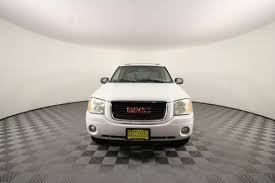 Image result for Medium Red 2003 Envoy