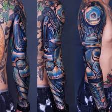 Motorcycle full sleeve tattoos for men creative tattoo. Radical Harley Davidson Motorcycle Engine Done As A Full Sleeve Tattoo Sleeve Men Biomechanical Tattoo Mechanical Arm Tattoo