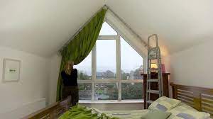 Is it one of those tiny bathrooms, with low sloped ceilings/walls and the tub tucked under it? Oldcourtcurtains Triangle Window Youtube